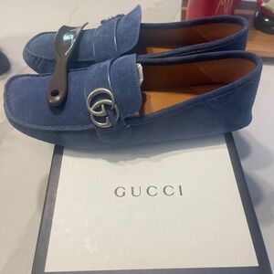 Men’s Gucci slip ons